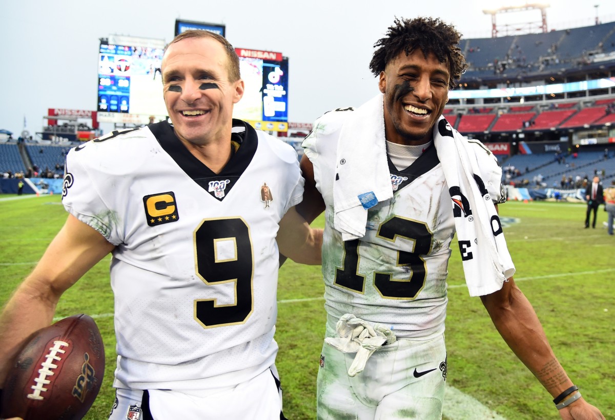 New Orleans Saints wide receiver Michael Thomas (13) and New Orleans Saints quarterback Drew Brees (9). Mandatory Credit: Christopher Hanewinckel-USA TODAY 